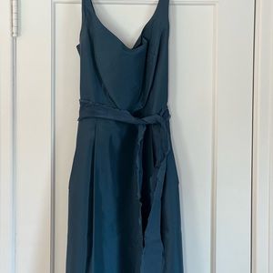 Worn as a bridesmaid’s dress this is a beautiful aquamarine dress.